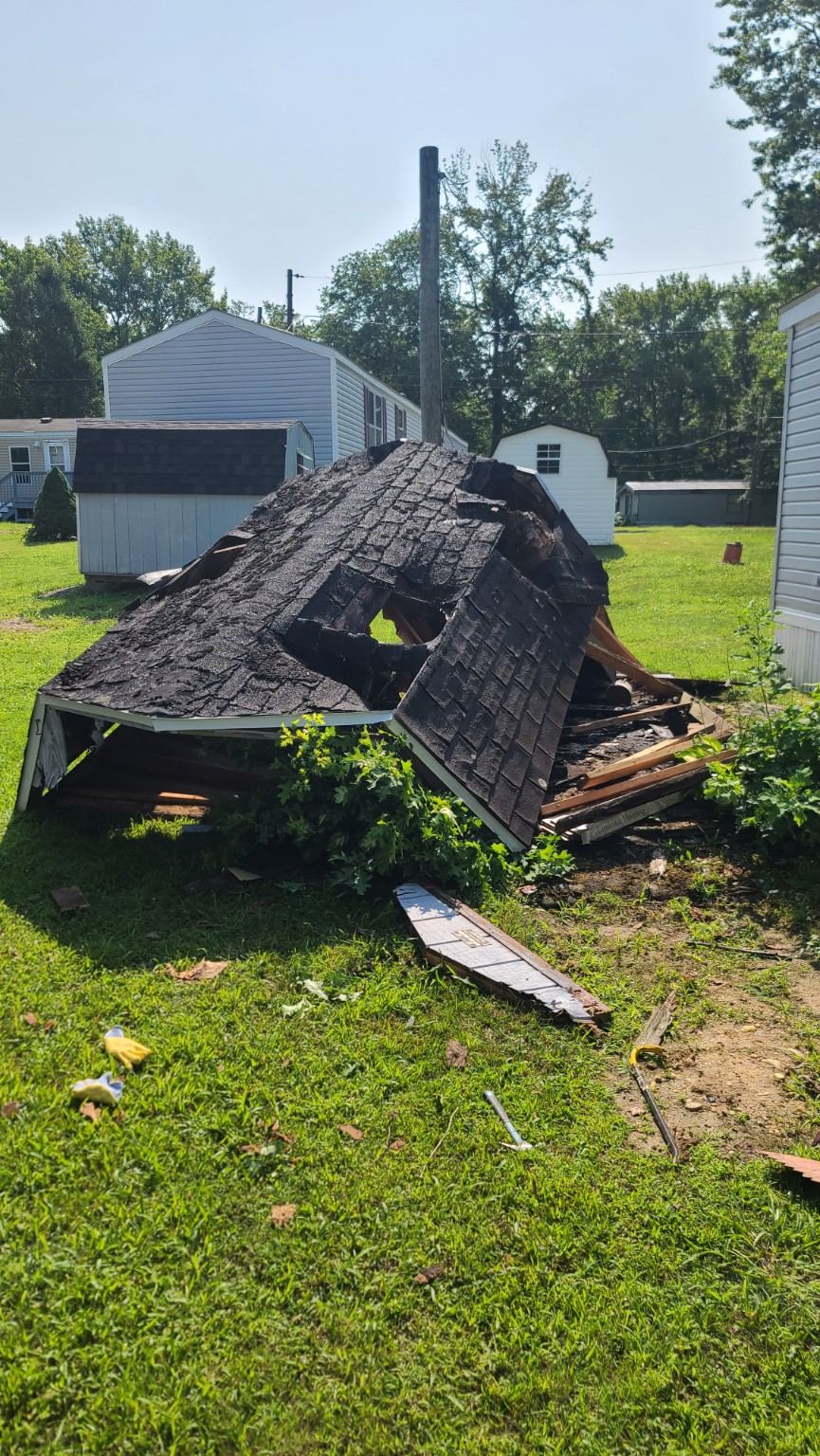 Collapsed shed before removal